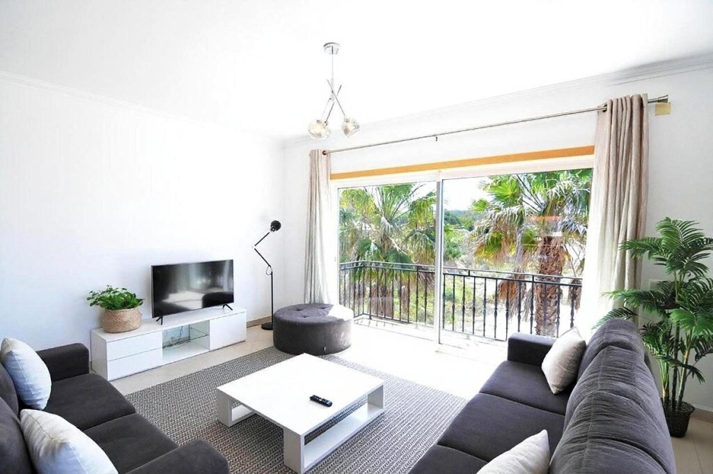 Light-filled living room opening onto the terrace